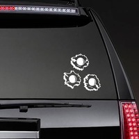 Bullet Holes - Gun Sticker on a Rear Car Window example