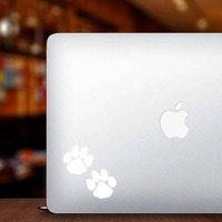 Cute Paw Prints Sticker on a Laptop example