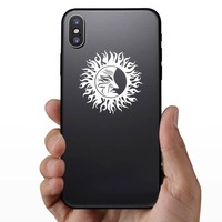 Grumpy Sun And Moon Sticker on a Phone example