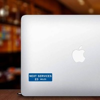 Next Services 23 Miles Sticker on a Laptop example