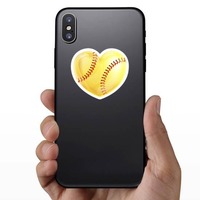 Shiny Yellow Heart Softball Sticker on a Phone example