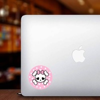 Skull With Bow And Polka Dots Sticker on a Laptop example